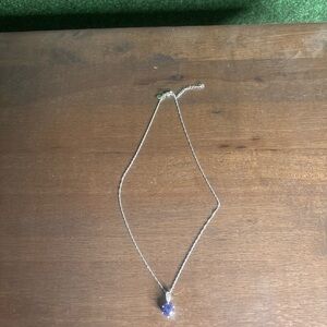 Elegant Silver Necklace with Purple Pendant